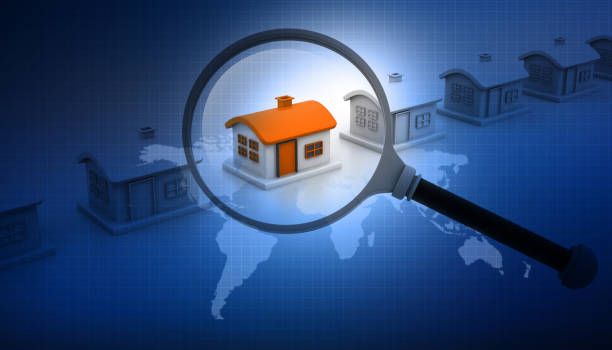 istock Magnifying glass searching for unique house 870394950