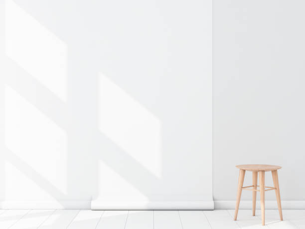 istock Empty room with White Blank Wallpaper roll Mockup hanging on the wall, chair 870398022