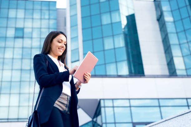 istock Businesswoman using a digital tablet 870401780