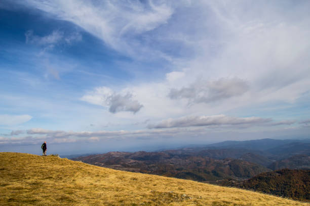 istock Man on the top of World 870402084