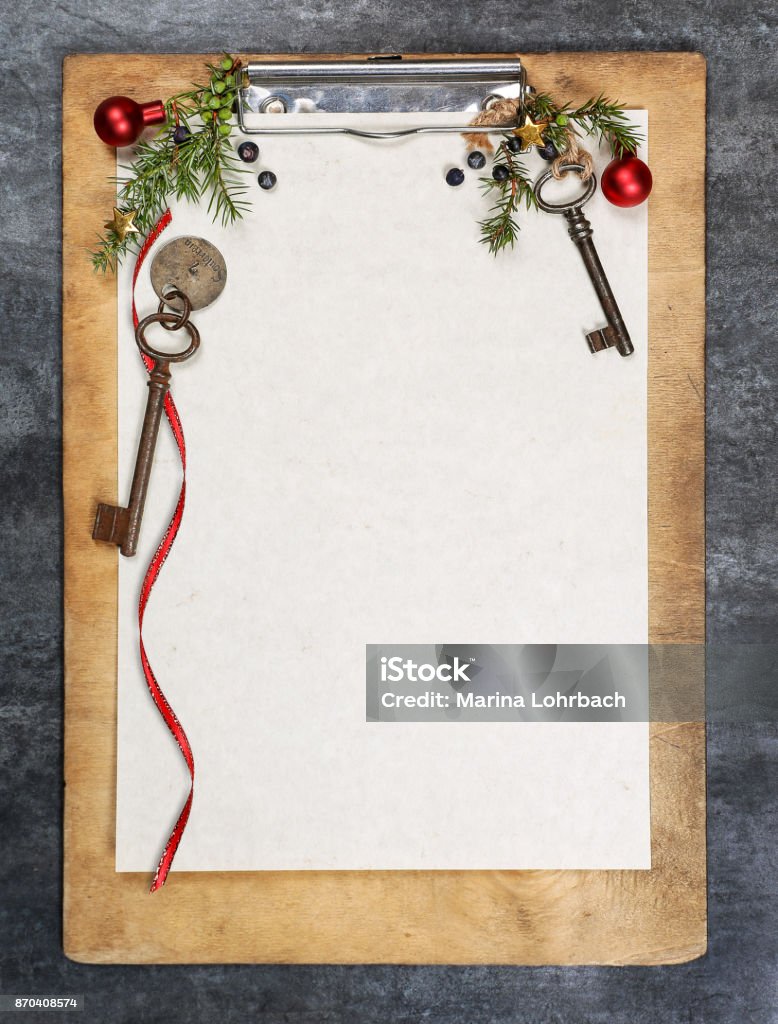Clipboard with paper Clipboard with christmas background and free space for text.Clipboard with christmas background and free space for text. Advent Stock Photo
