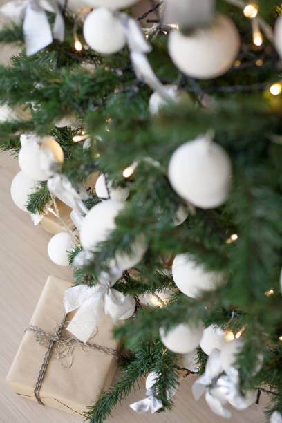 istock Christmas tree with presents, Garland lights new year postcard 870412218
