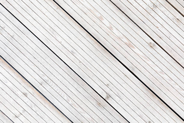 istock Aligned frozen striped blank boards in winter 870412660