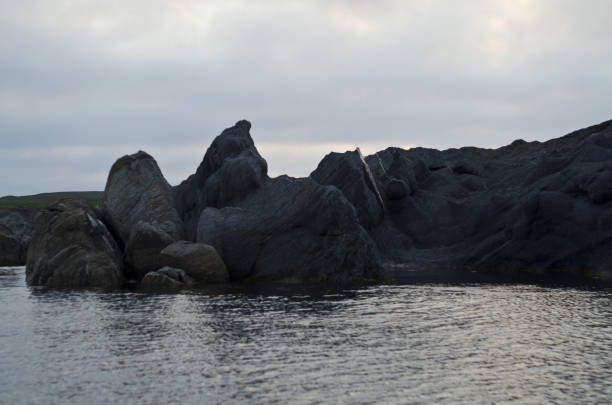 istock Rocks by the sea 870413950