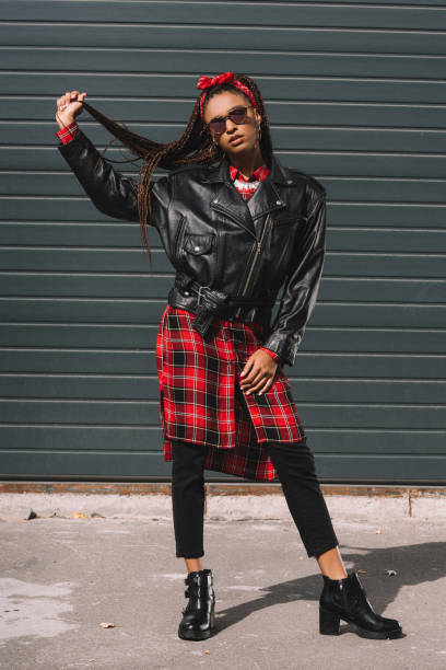 istock african american girl in leather jacket 870416132