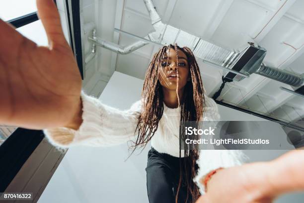 African American Girl Taking Selfie Stock Photo - Download Image Now - Low Angle View, Child, Selfie