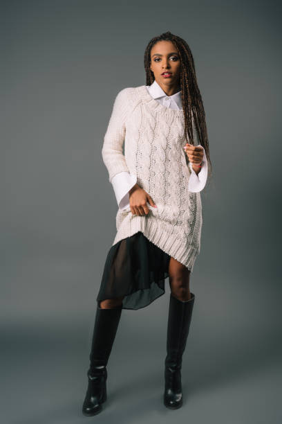 istock girl in stylish knitted sweater 870419232