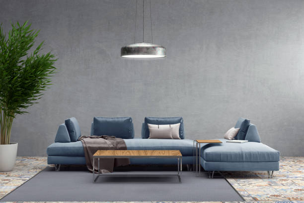 istock Modern pastel colored sofa in front of a blank wall - copy space template 870427856