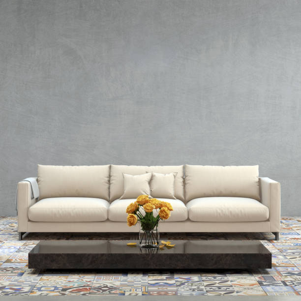istock Modern white sofa in front of blank gray wall - interior copy space template 870427858