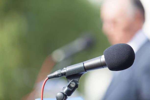 istock Political campaign. Press conference. Microphone. Speaker. Speech. 870430382