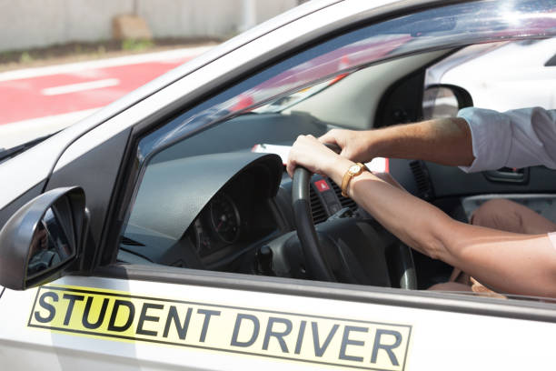 istock Driving school. Learning to drive a car. 870431658