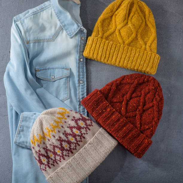 istock Jeans shirt and three winter hats 870438882