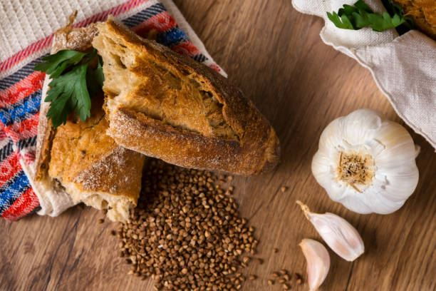istock Fresh bread, buckwheat bread, garlic bread, French baguette 870448606