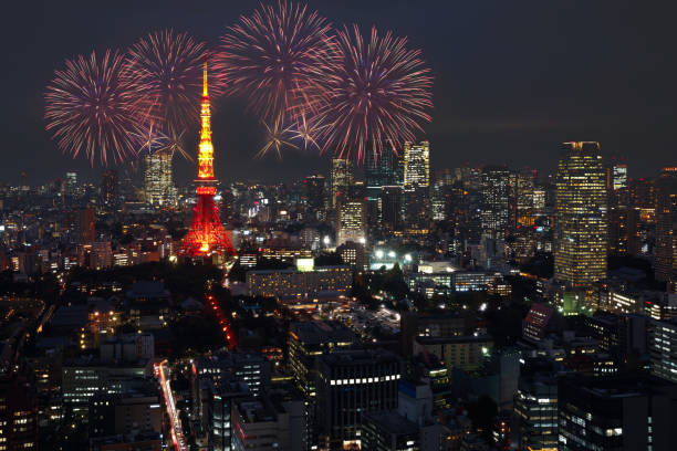 istock Fireworks celebrating over tokyo cityscape at night 870448682