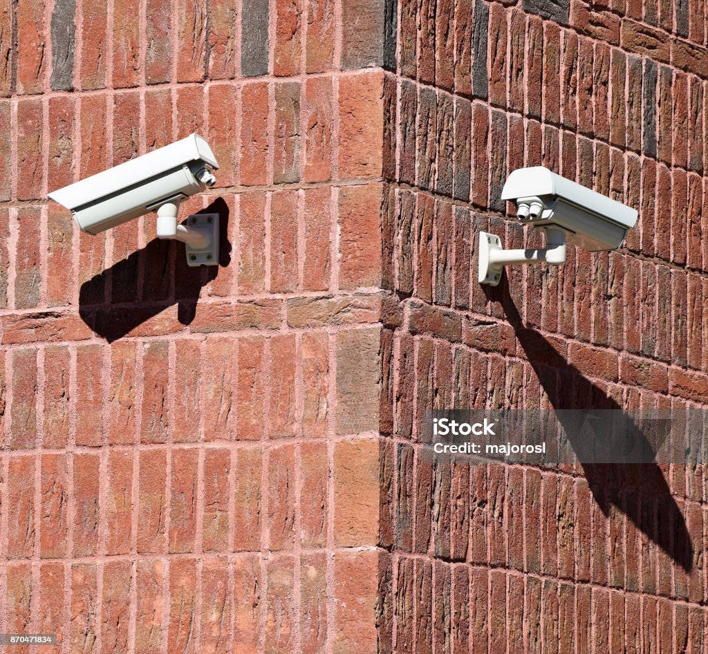 Security cameras on the wall Burglar Alarm Stock Photo