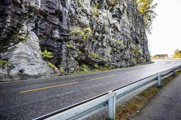 istock Autumn road in the mountains 870474326