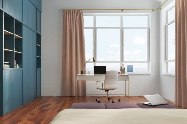 istock White bedroom and home office interior 870484976