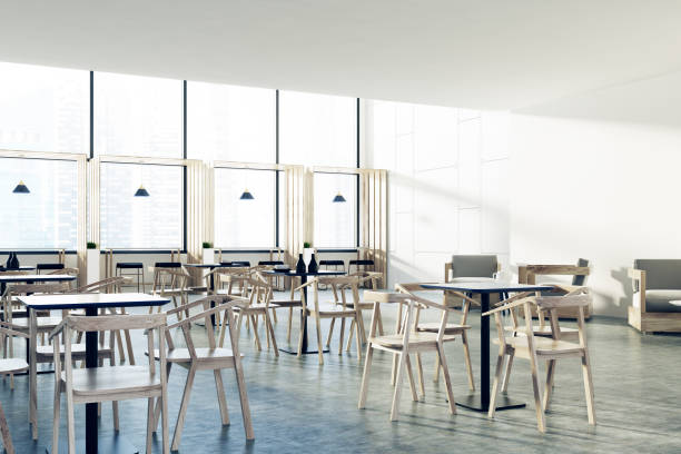 istock Loft cafe black tables, wooden chairs, corner 870486468