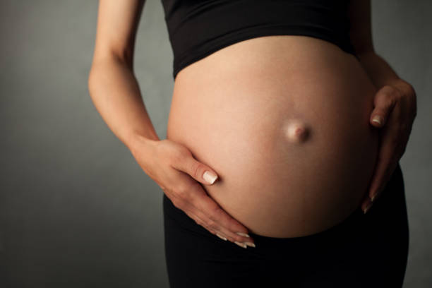 istock Pregnant woman in studio 870491730