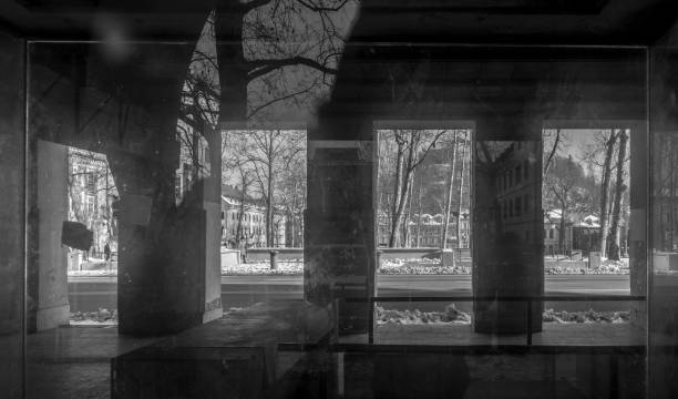 istock Black and white street shot with reflections 870495668