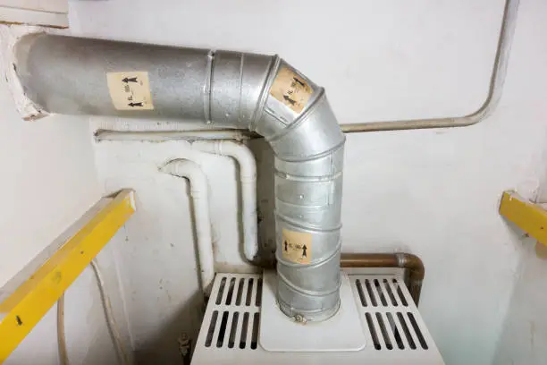 Gas pipe of an old domestic gas central heating boiler.