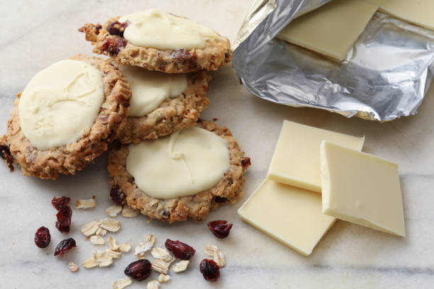 istock Four Oatmeal Cranberry Cookies And White Chocolate 870499492