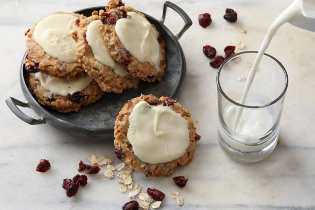 istock Pouring Milk For The Oatmeal Cookies 870499498
