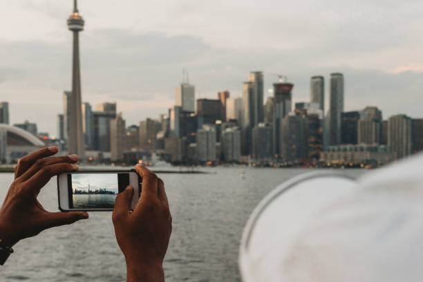 istock Photographing Toronto skyline with mobile phone 870513692