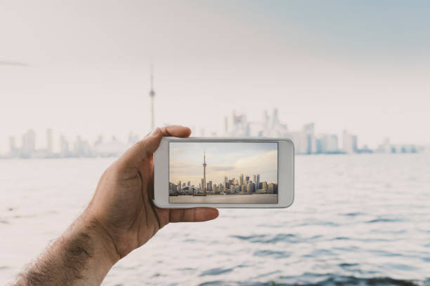 istock Photographing Toronto skyline with mobile phone 870513744