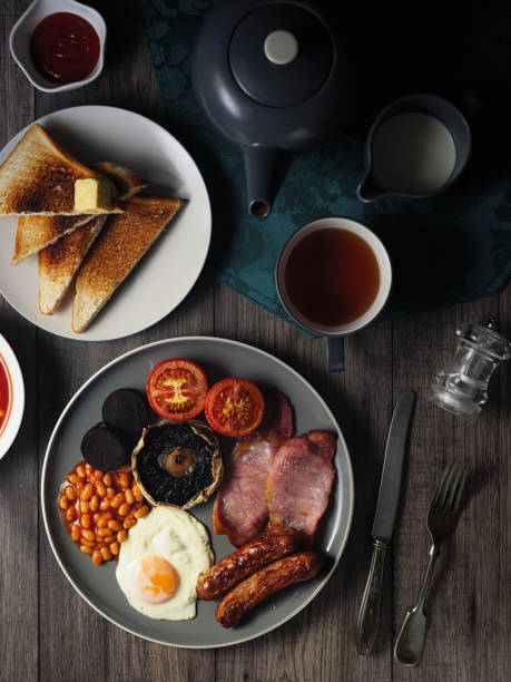 englisches frühstück - tea sausage stock-fotos und bilder