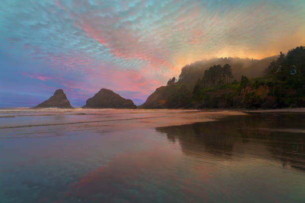 Foggy Sunset at Heceta Head Lighthouse along Oregon Coast USA stock photo