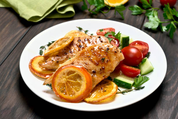 istock Chicken breast with orange sauce 870528550