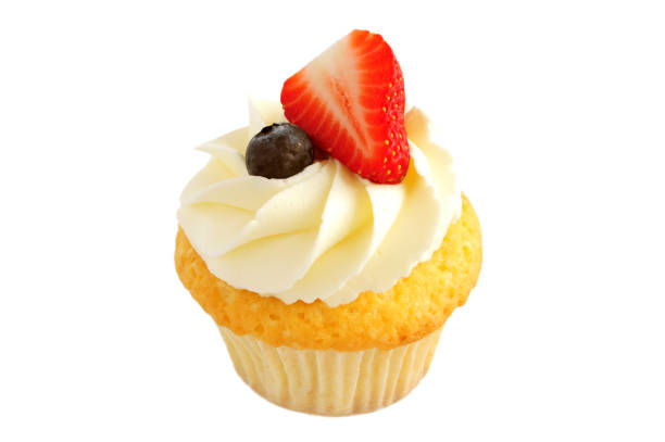 istock Cupcake with whipped cream, fresh strawberry, blueberry. 870531056