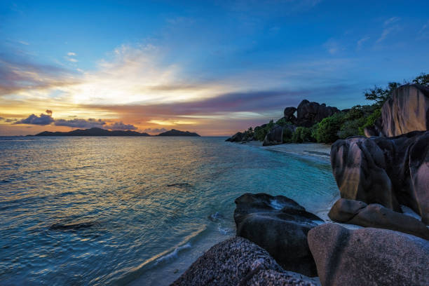 istock romantic sunset in paradise, silver spring cove, the dike, seychelles 4 870534676