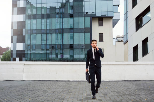 istock Businessman with a bag. 870535920