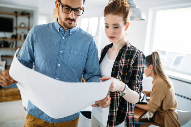 istock Image of business partners discussing documents and ideas 870542466