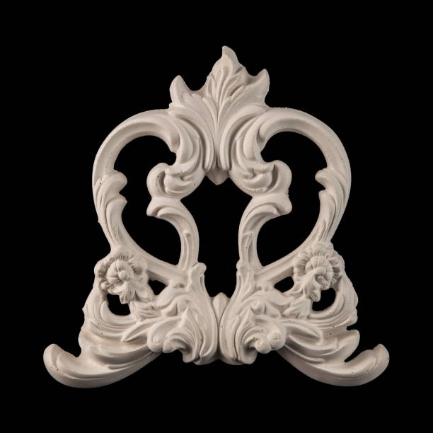 Luxury frame made of silver stucco plaster lying on golden surface. Text place, copy space. Top view. Fashion background