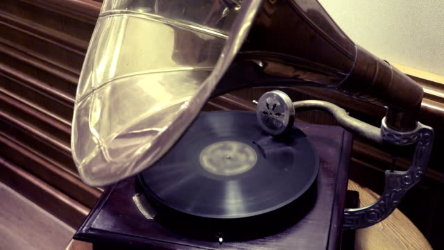 old retro gramophone turning, side view