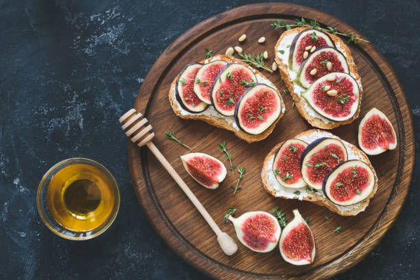 istock Fresh fig and cheese bruschetta toast 870549198