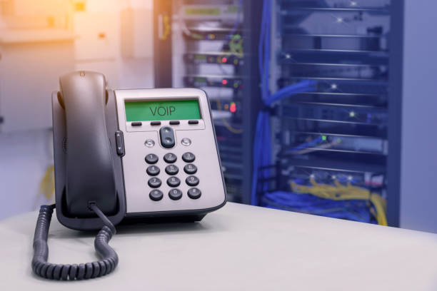 istock VOIP Phone (IP Phone) in data center room 870549288