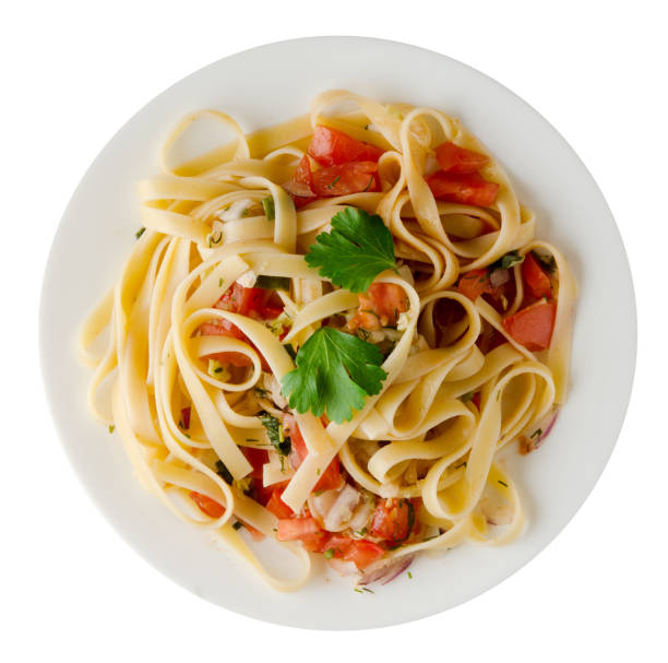 spaghetti auf einer platte - basil bowl cooked cheese stock-fotos und bilder