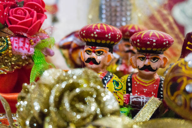 Rajasthani puppets depecting a bridal ceremony Beautifully made traditional rajasthani puppets showing a bridal ceremony. The puppet for the bride, the musicians are shown in the traditional dresses rajasthani puppets stock pictures, royalty-free photos & images