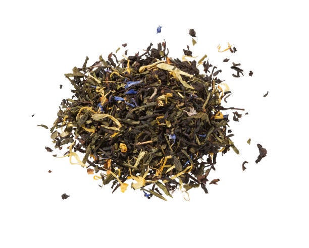 istock Dry tea with herbs isolated on white. Mix green tea. 870556840
