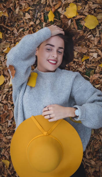 istock Lying in autumn leaves 870571464