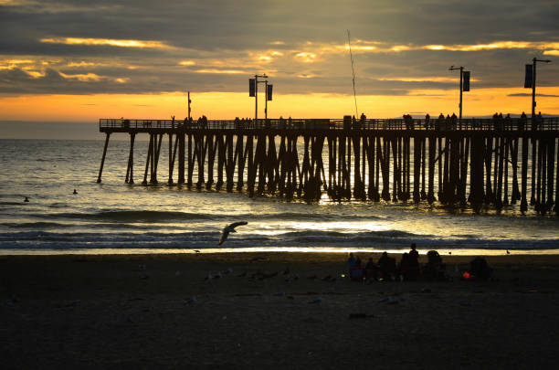 istock Silhouette of the pier at sunset. 870578444