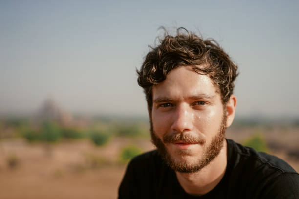 istock Young man sweaty looking in Camera tourist happy joy, wander tra 870578822