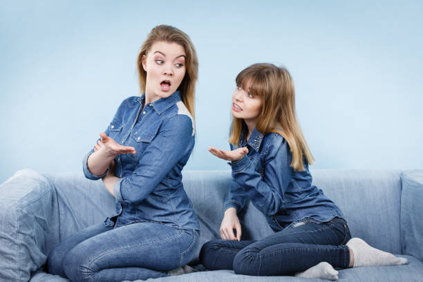 istock Two women after argue, female being offended 870582570