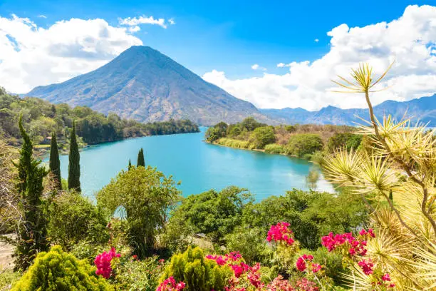 Beautiful bay of Lake Atitlan with view to Volcano San Pedro  in highlands of Guatemala,  travel destination in Central America