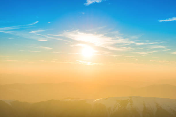 istock Sunset over hills and mountains 870595622