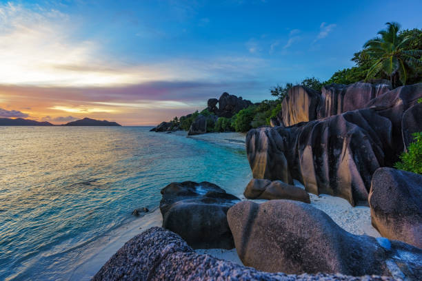 istock romantic sunset in paradise, silver spring cove, the dike, seychelles 3 870605762